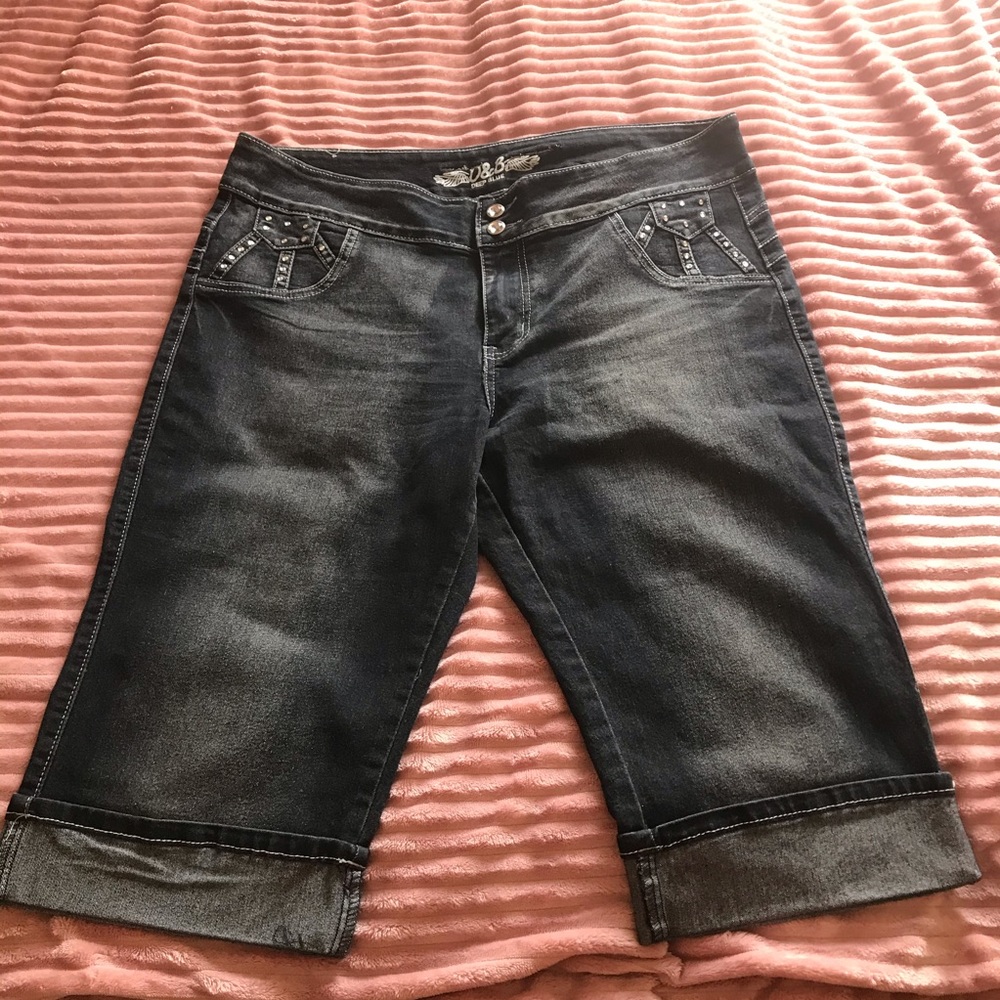 Lightly distressed black capris
